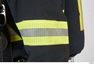 Sam Atkins Firefighter in Protective Suit arm details of uniform…